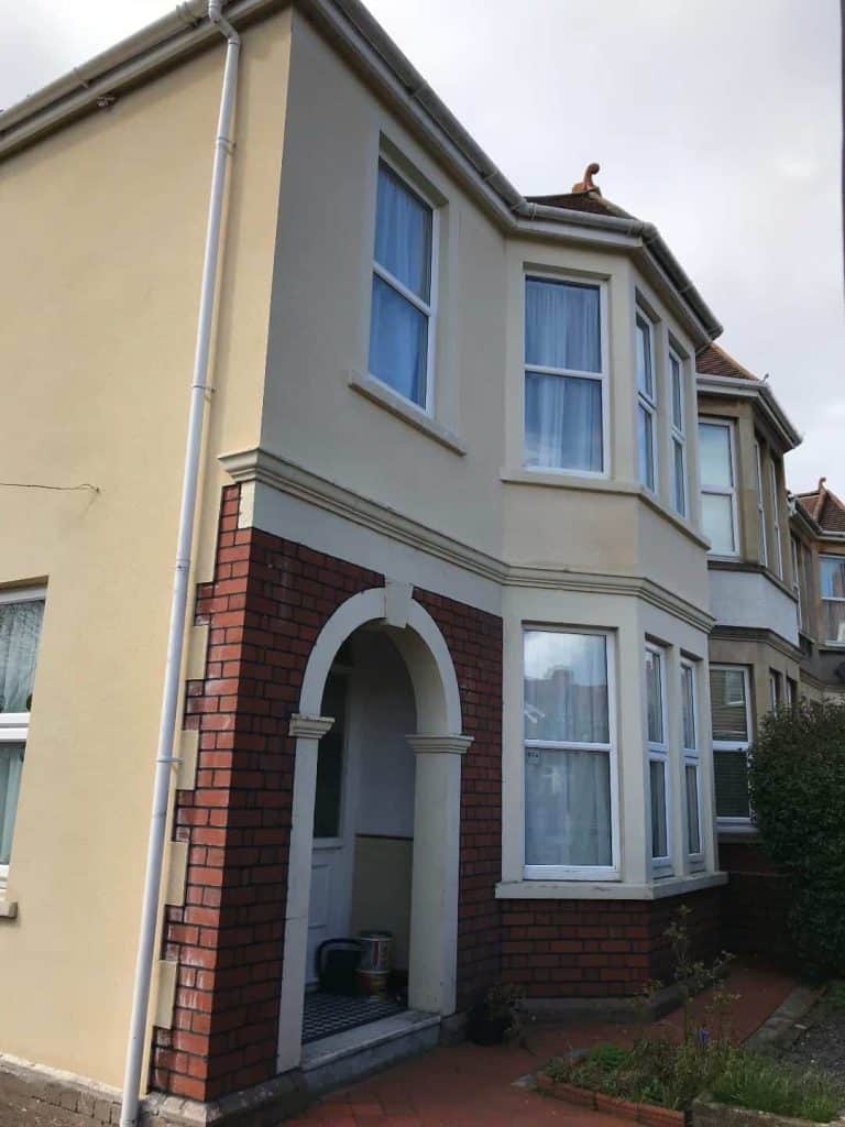 House with recently cleaned render